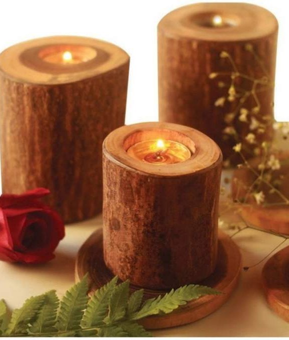 Turned wooden candle holders in four heights