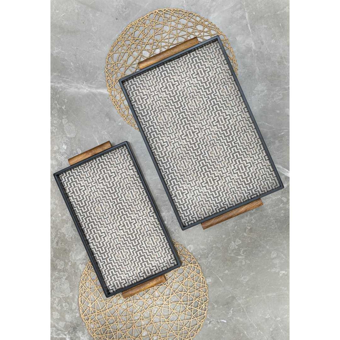 Rattan trays stacked on a table
