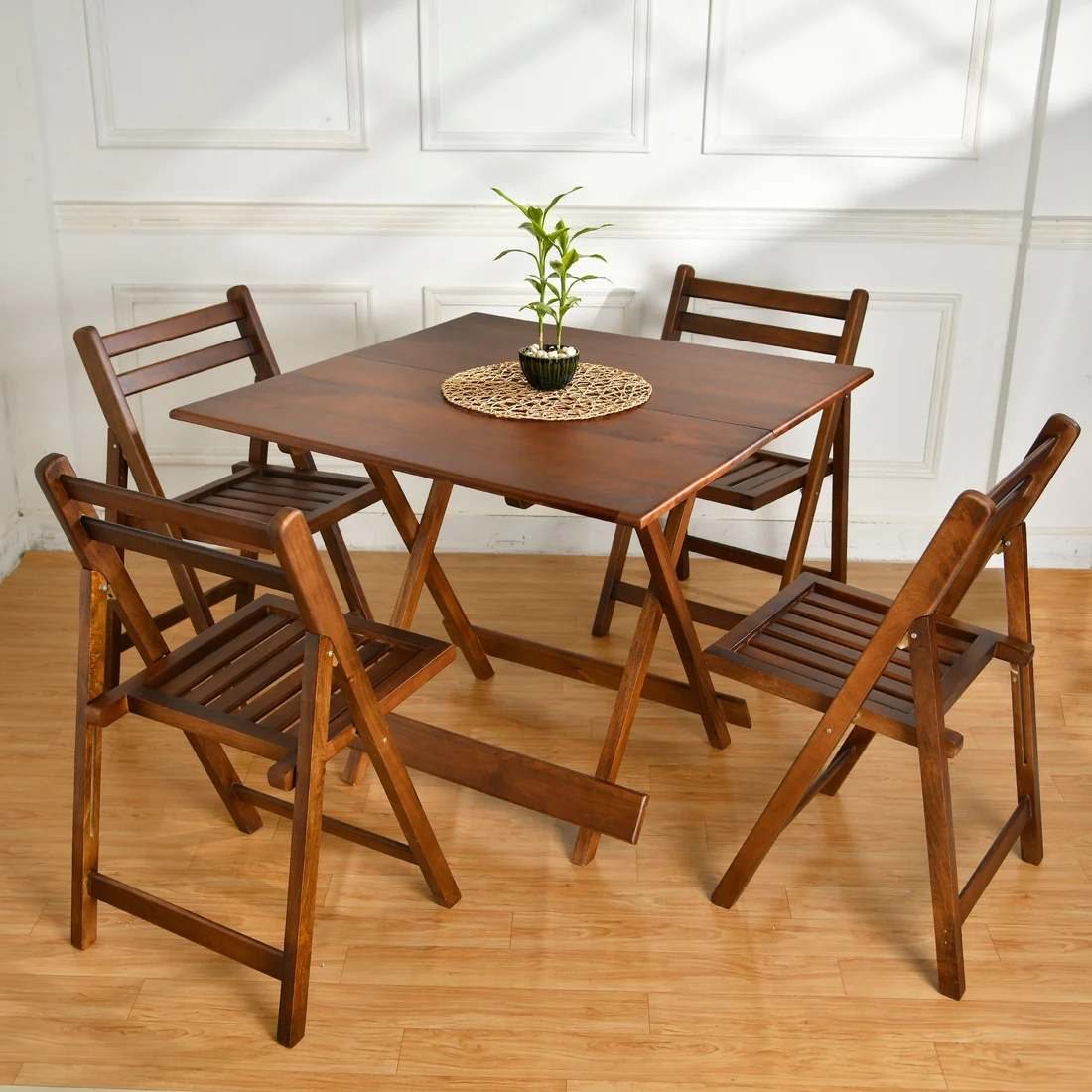 Folding table and chairs laid in a room